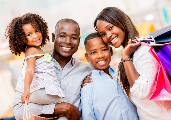 Portrait of a family shopping and looking very happy